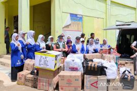 UNJA dan UNSAM salurkan bantuan ke sekolah di Aceh Tamian