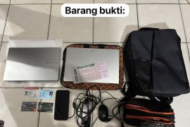 Seorang pria menyamar jadi wanita untuk mencuri laptop di Kendari