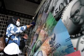 Penukaran uang baru di Malang