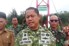 Dandim 0310/SSD resmikan jembatan gantung Ampang Kuranji Dharmasraya