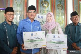 Bupati Tanjab Barat Pimpin Aksi Zakat, Kumpulkan Rp152 Juta untuk Kesejahteraan Umat