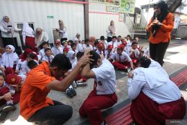 Pelajar SD belajar mitigasi bencana