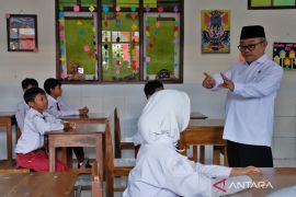 Minister stresses mindset, mentality, mission to advance education