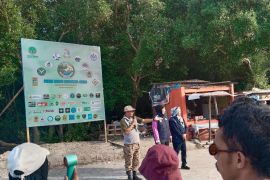 Kampanye dukung Gerakan Nasional ASRI  di Kampung Nelayan Untia Makassar