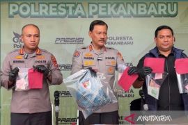 Pembunuhan Pekanbaru: Pelaku berniat kuras harta hingga bunuh satu keluarga