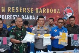 Aceh airport foils meth smuggling, four couriers arrested