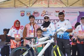 Bupati Dharmasraya apresiasi Road to Police Women Run 2026