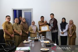 Perkuat layanan Posbankum Desa dan Sinergi Kukerta, Kakanwil Kemenkum Riau temui Bupati Kampar