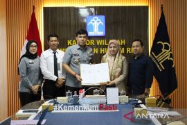 Perkuat sinergi hukum dan pendidikan, Kemenkum Riau tangandatangani PKS dengan Politeknik Pengadaan Nasional