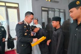 Kapolres Agam santuni puluhan anak Panti Asuhan Putra Muhammadiyah