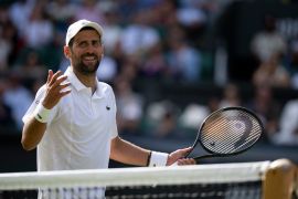 Djokovic mencapai perempat final Wimbledon sembari pecahkan rekor Federer