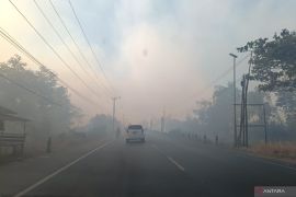 Kabut asap buat jarak pandang lebih kurang 10 meter
