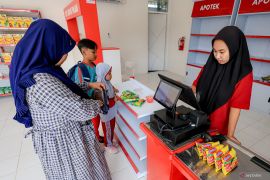 Grocery stores anchor village cooperative operations: Minister