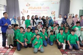 KemenPPPA gandeng Alfamidi semangati ratusan anak disabilitas