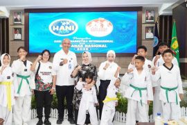 Pemkab Langkat komitmen lindungi generasi muda pada Peringatan HANI dan Hari Anak Nasional 2026