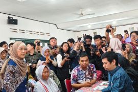 Indonesia pilots digital system to improve welfare aid targeting