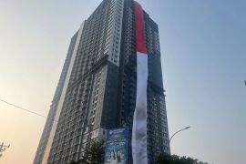 Pembentangan kain merah putih di Apartemen Evencio Depok raih rekor MURI