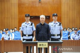 Miliarder properti China divonis penjara seumur hidup karena penipuan