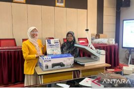 Pelatihan desain dan produksi merchandise berbasis digital printing sebagai pengembangan kompetensi kewirausahaan siswa SMA Pembangunan Laboratorium UNP