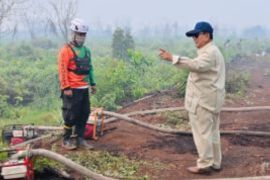 Presiden tinjau langsung  penanganan karhutla di Desa Limbung