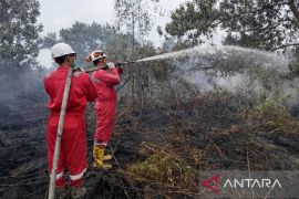 EMP Bentu salurkan 18 ribu masker dan bantu pemadaman karhutla di Pelalawan