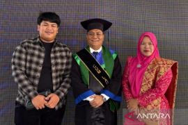 Sekda Palas Panguhum Nasution sandang gelar Doktor USU