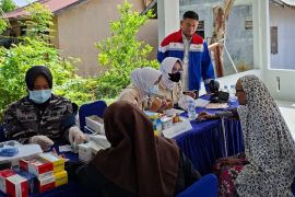 Bantu masyarakat pesisir, PHE NSO dan Lanal Lhokseumawe gelar bakti sosial