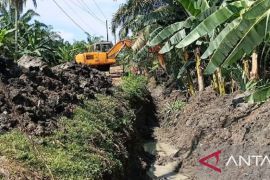 Pembersihan drainase bantu kurangi potensi genangan di Desa Belongkut