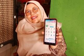 Fitri Rasakan Manfaat JKN, Berobat Mudah dan Layanan Digital Makin Praktis