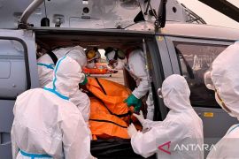 Search team recovers 11 more bodies after ship sinks in Java Sea