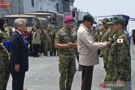 RI awards military honor to 361 Japan disaster relief personnel