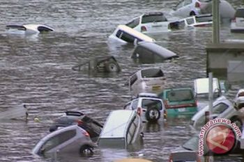 Japan disaster death toll likely to pass 1,000: Kyodo