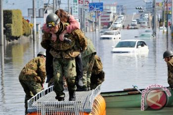 Japan disaster death-missing toll passes 11,000: police