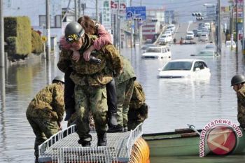 Japan disaster dead, missing pass 13.000: police