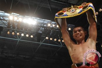 Chris John to defend his title again next October