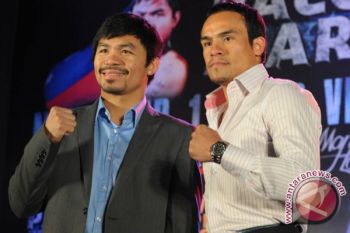 Tinju : Pacquiao 143, Marquez 142