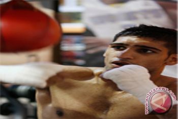 Khan vs Garcia Pada Juli