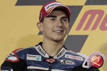 Lorenzo di puncak setelah menjuarai MotoGP Prancis