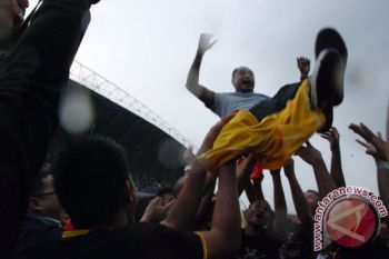 Pemain Sriwijaya FC  lakukan selebrasi 