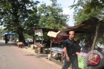 Pedagang bunga tabur TPU Palembang laris