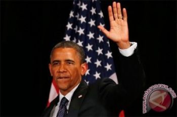 Obama Peringatkan Suriah Agar Tak Gunakan Senjata Kimia
