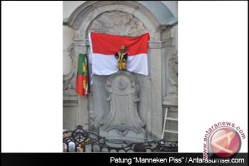 Patung " Mannaken Piss" Belgia kenakan beskap Yogyakarta