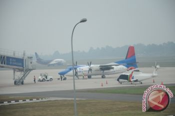Pesawat terpaksa berputar-putar akibat asap Pekanbaru