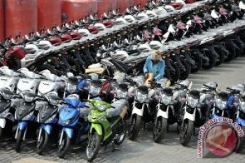 "Think Green, Act Safely" Pameran Sepeda Motor Indonesia 
