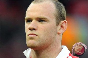 Rooney Pegang Ban Kapten Inggris