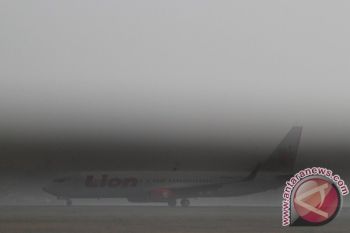 BANDARA DISELIMUTI KABUT ASAP