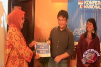 Dosen Unsrat Juara Karya Tulis Di Perancis