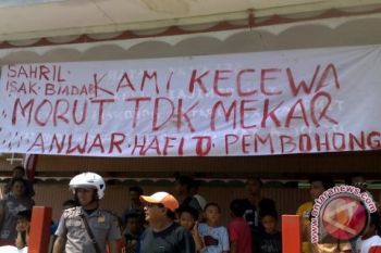 Demonstran Di Kolonodale Bakar Mobil Dinas