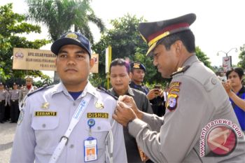 Penyematan Pita Operasi Lilin
