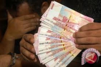 Pedagang Tangkap Pengedar Uang Palsu